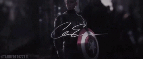 Chris Evans Is Holding A Captain America Shield In A Dark Room GIF