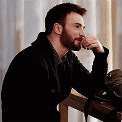 Chris Evans Thinking & Smiling GIF