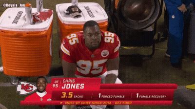 Chris Jones Sitting On Field GIF