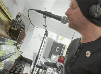 Chris Martin Singing And Smiling GIF