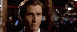 Christian Bale American Psycho Mocking Smile GIF