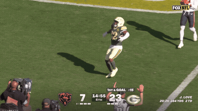 Christian Watson Standing In Front Of Crowd GIF