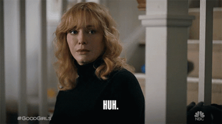 Christina Hendricks Saying Huh While Blinking GIF