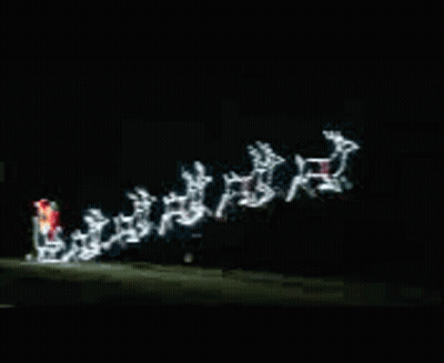 Christmas Sleigh Pulled By Reindeer In Dark GIF