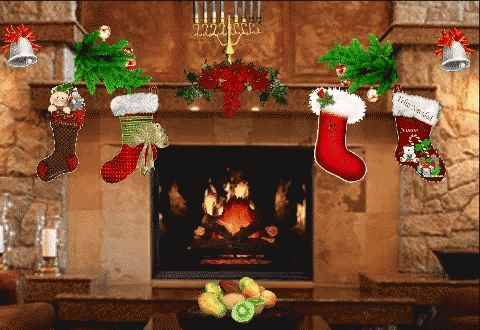 Christmas Stockings Hanging From A Fireplace With One That Says ' Feliz Navidad ' On It GIF
