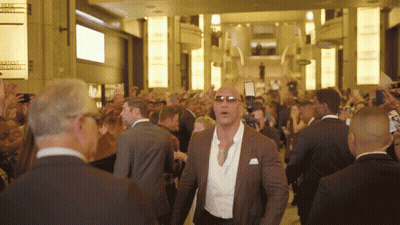 Christmas Tree In Front Of Halftime Report Wall GIF
