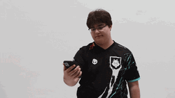 Chubby Guy Looks At Phone But Not Again GIF