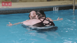 Chubby Lady Hops In Pool Drowns Friend GIF