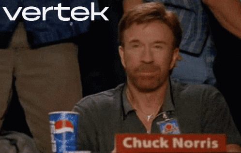Chuck Norris Is Sitting At A Table With A Pepsi Can In Front Of Him GIF