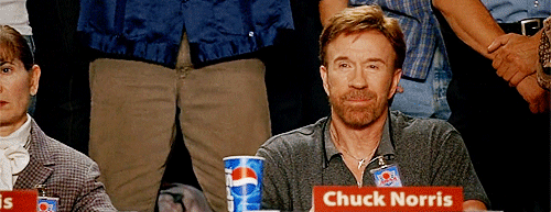 Chuck Norris Sits At A Table With A Pepsi Can GIF