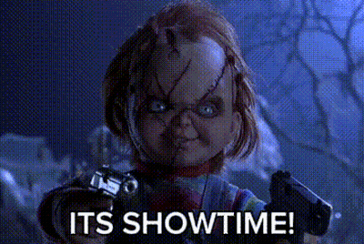 Chucky Doll Holding Gun It's Showtime GIF
