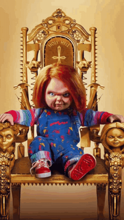 Chucky Doll On Gold Chair Saying Holy Hell GIF