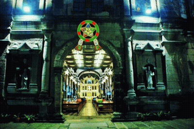 Church Lit Up At Night With Star GIF