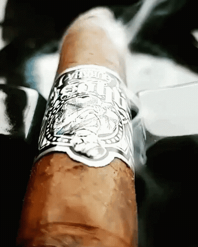 Cigar With Silver Mustang Label GIF