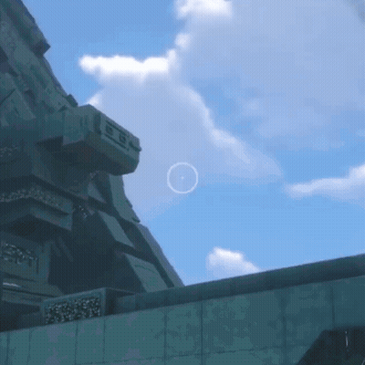 Circle In Sky With Building GIF