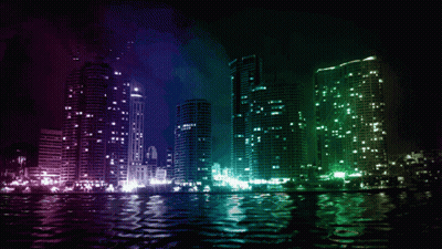 City Skyline At Night With Green And Purple Lights Reflected In Water GIF