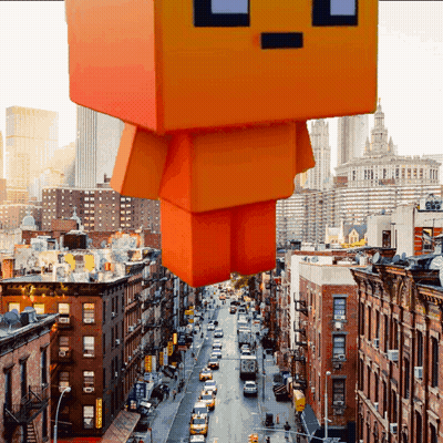 City Street With Giant Orange Block GIF