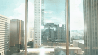 City View Through Window With Sun Shining GIF