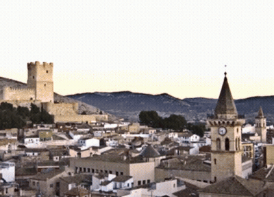 Cityscape With Clock Tower And Castle GIF