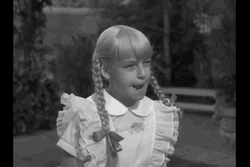 Classic Bad Seed Scary Face GIF