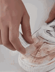 Cleaning Shoes Using Eraser GIF