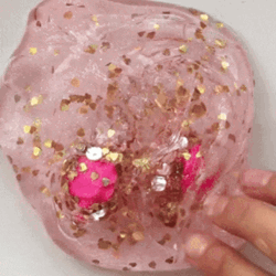 Clear Pink Slime With Charms GIF