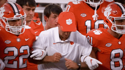 Clemson Football Players Gathered Around Coach GIF