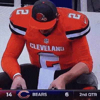 Cleveland Football Player Sitting On Bench GIF