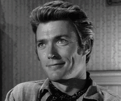 Clint Eastwood Laughing Smile GIF