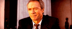 Clint Eastwood Waving Bye GIF