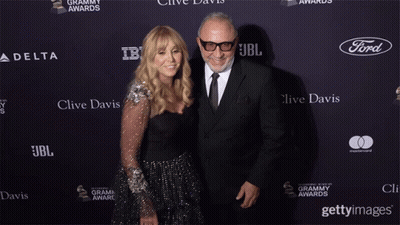 Clive Davis And Wife On Red Carpet GIF