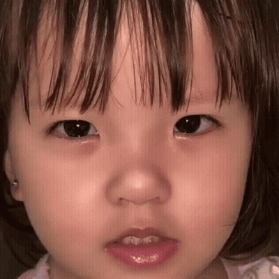 Close Up Baby With Tear Running Down Eye GIF