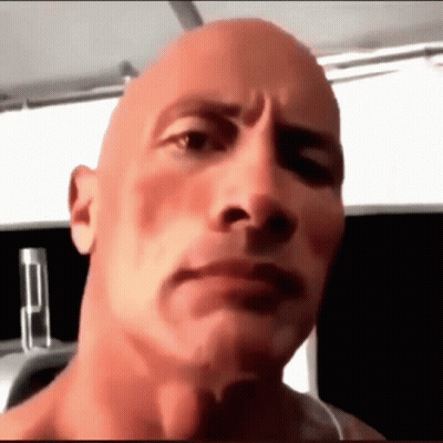 Close Up Bald Man Serious Expression GIF