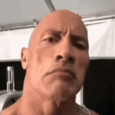 Close Up Bald Man Serious Expression GIF
