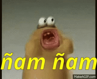 Close Up Cartoon Character Saying Ham Ham In Yellow Letters GIF