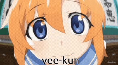 Close Up Cartoon Character With Vee-Kun Below