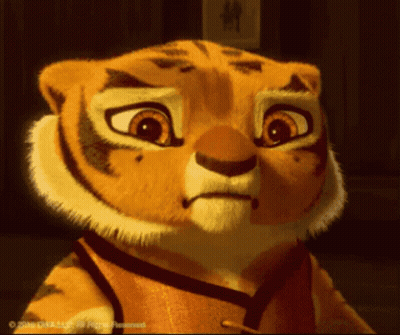 Close Up Cartoon Tiger Face With Copyright Watermark GIF