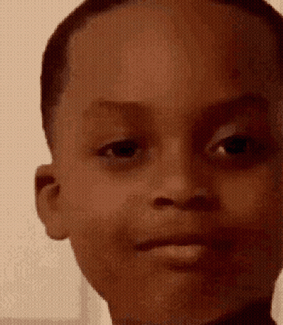 Close Up Child Serious Face GIF