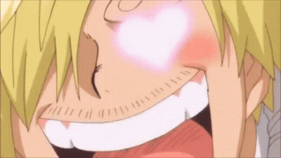 Close Up Face Blowing Heart GIF