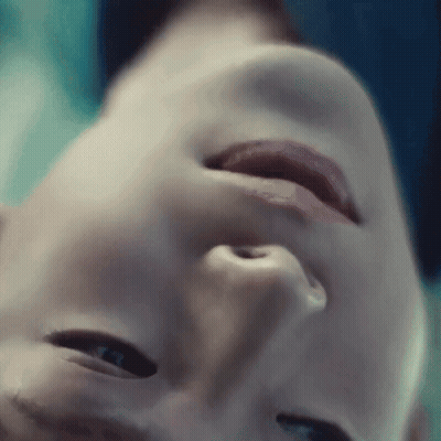 Close Up Face Blue Background GIF