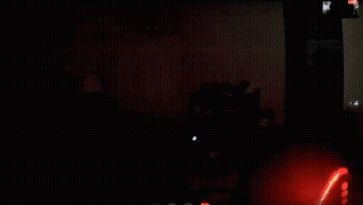 Close Up Face In Dark Room GIF