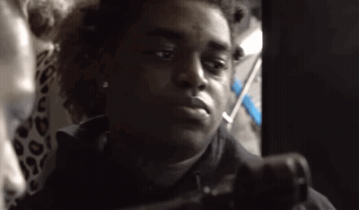 Close Up Face In Dark Room With Woman GIF