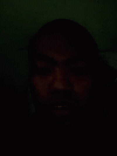 Close Up Face In Dark With Eyes Closed GIF