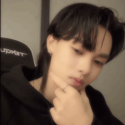 Close-Up Face In Front Of Upmet Chair GIF