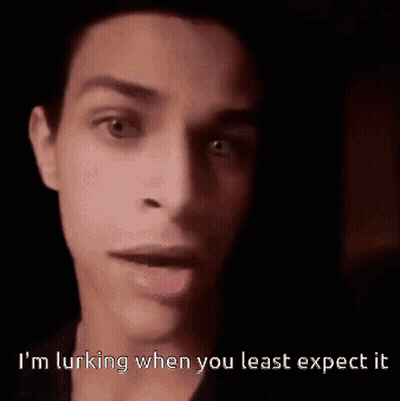 Close Up Face Saying I'm Lurking When You Least Expect It GIF