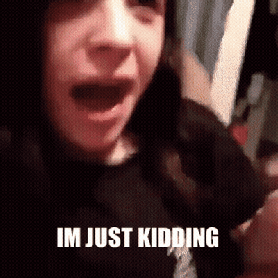 Close Up Face Saying Im Just Kidding GIF