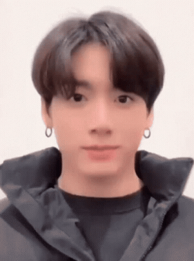 Close Up Face With Black Jacket And Earrings GIF