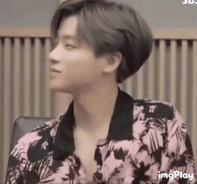 Close Up Face With Black Shirt And Necklace GIF