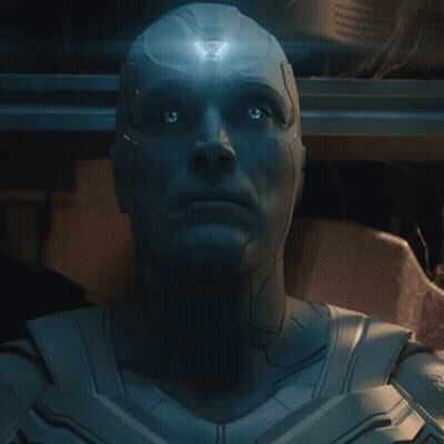 Close Up Face With Blue Light From Eyes GIF