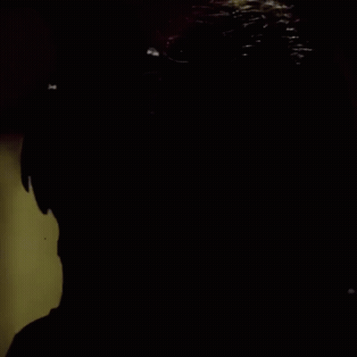 Close Up Face With Blue Paint GIF